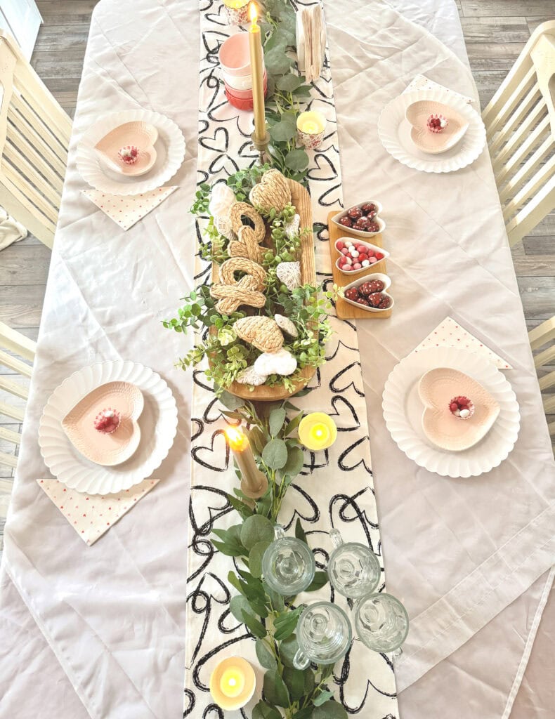 valentine top view tablescape with neutral colors and subtle heart decor