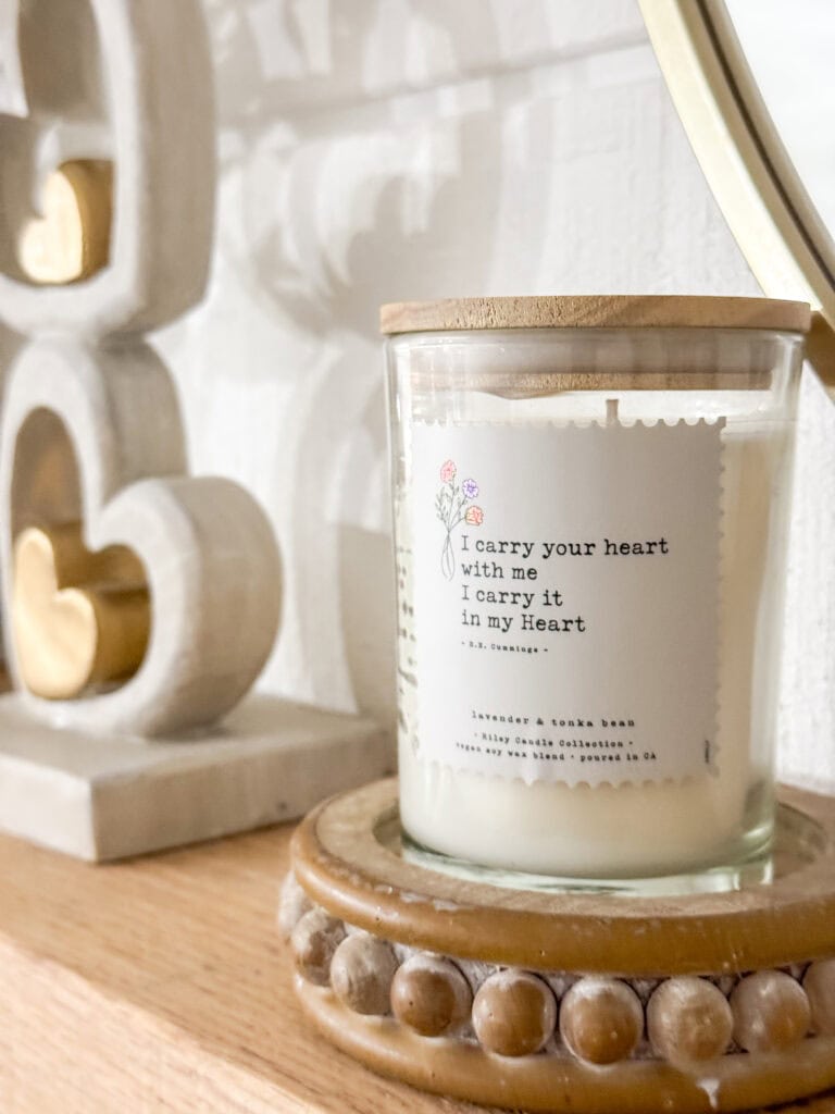 candle in a jar for Valentine's Day on mantel for sublte valentine's decor