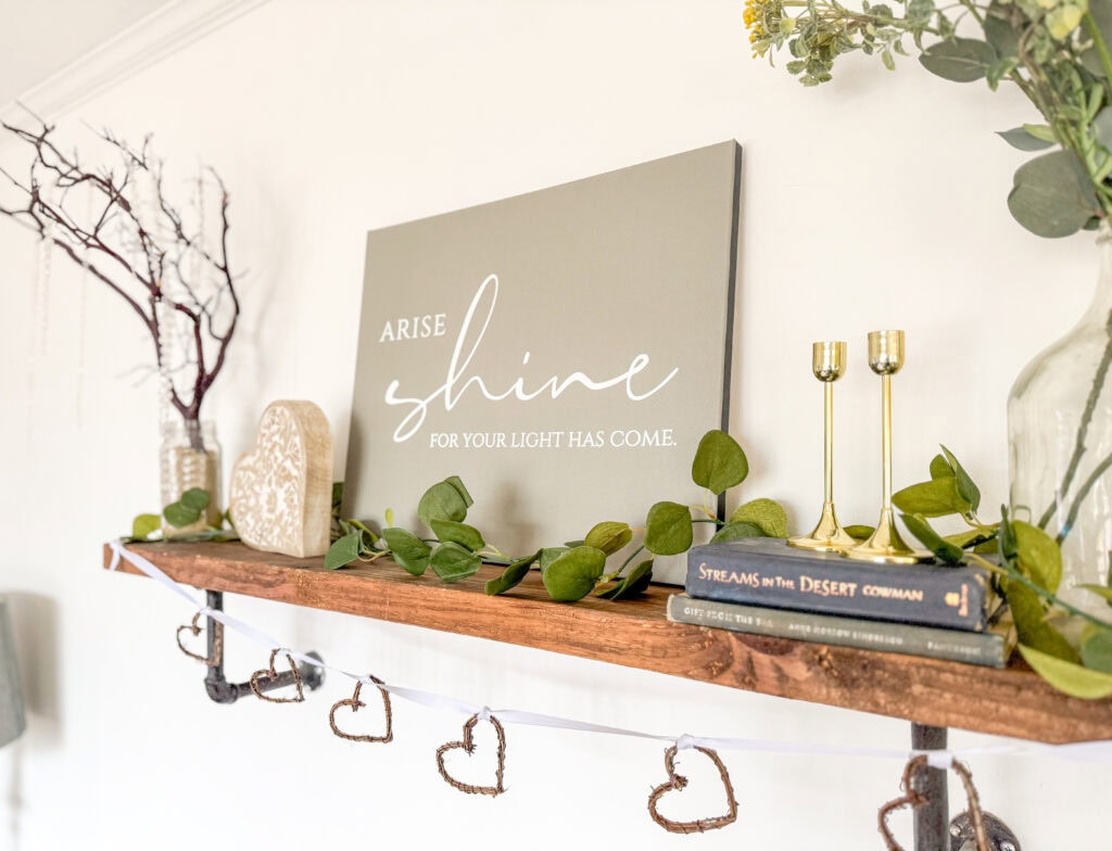 valentine shelf with canvas sign, heart garland, manzanita branch in jar, subtle valentine's day decor