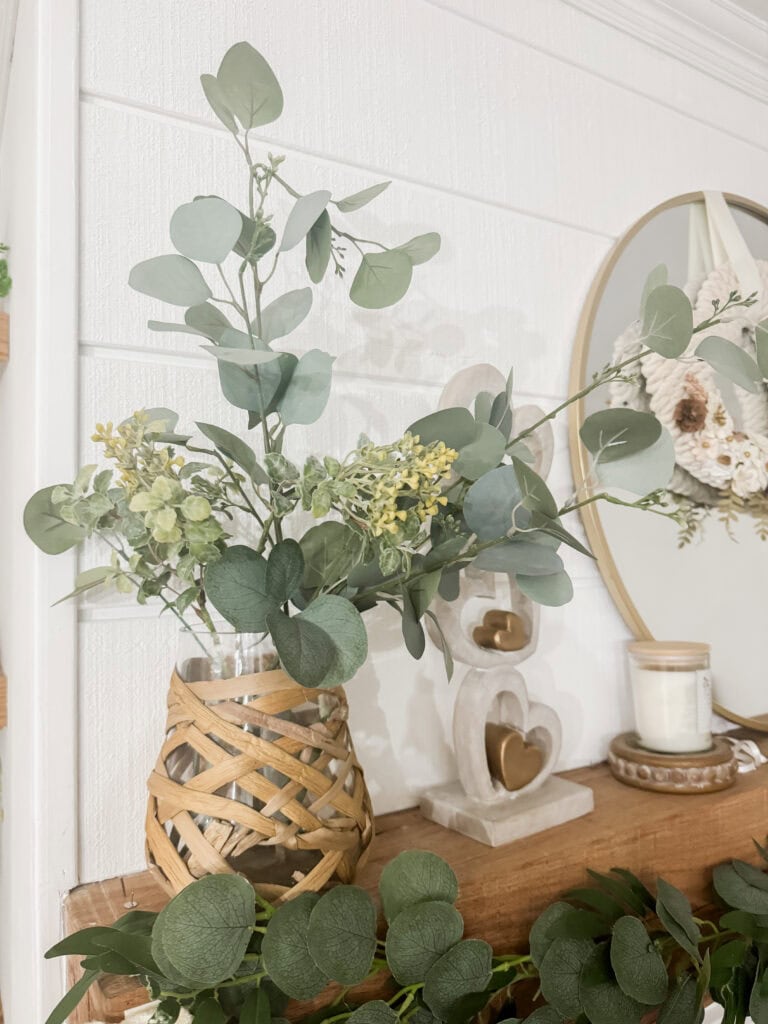 eucalyptus and yellow faux florals on neutral valentines day mantel with organic modern style