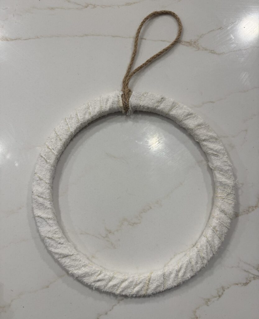 ribbon wrapped around wood wreath form