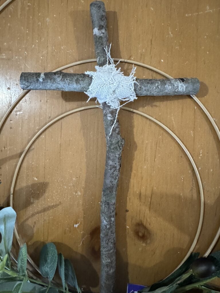 wrapped wood sticks cross
