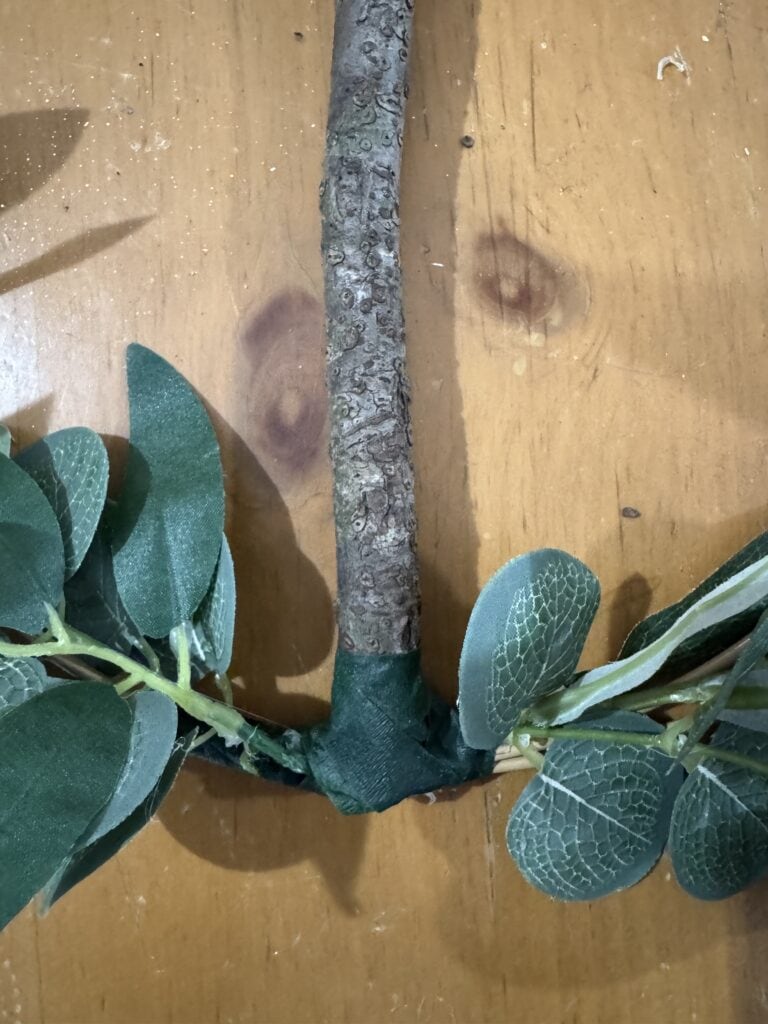 base of cross wrapped with floral tape