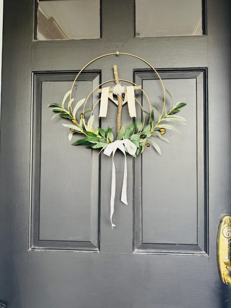 cross easter wreath on door