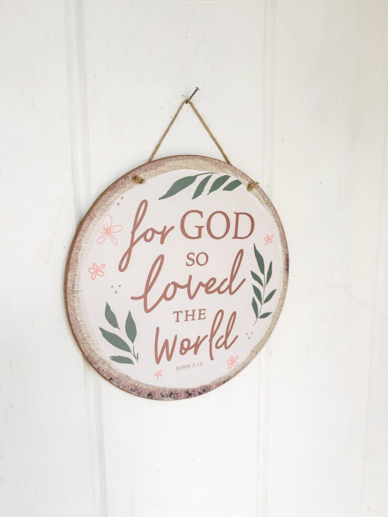 for God so loved the world sign on porch