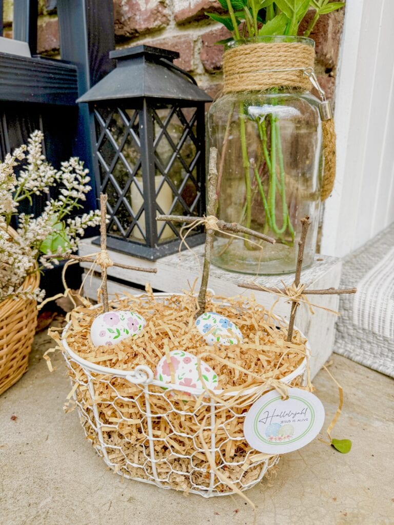 Easter porch decor with basket of 3 crosses and wood floral eggs
