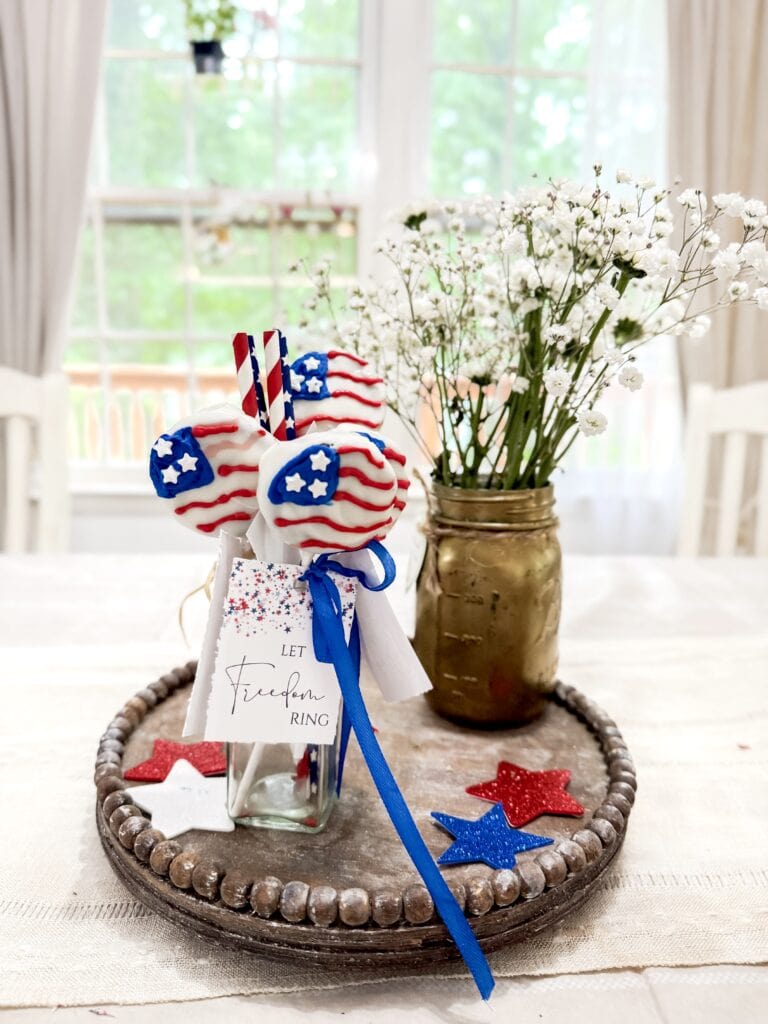 patriotic flag oreos in jar on table centerepiece with flowers