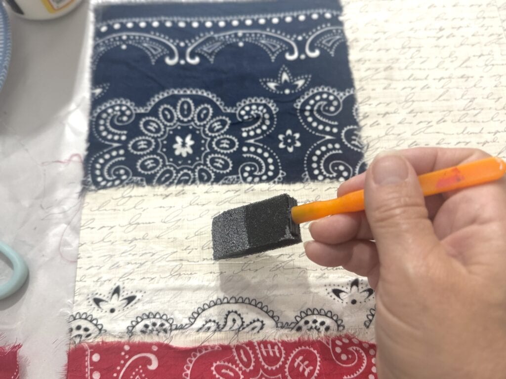 Mod podge stripes down on flag
