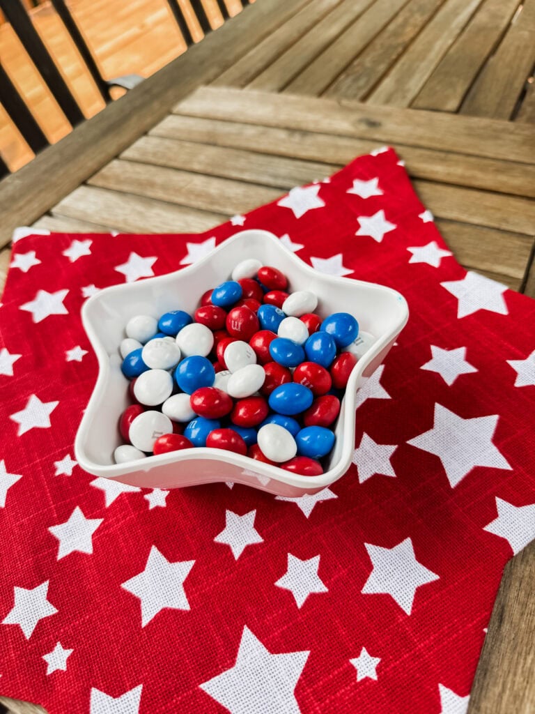 red star placemat with white stars and white star dish with patriotic M&Ms