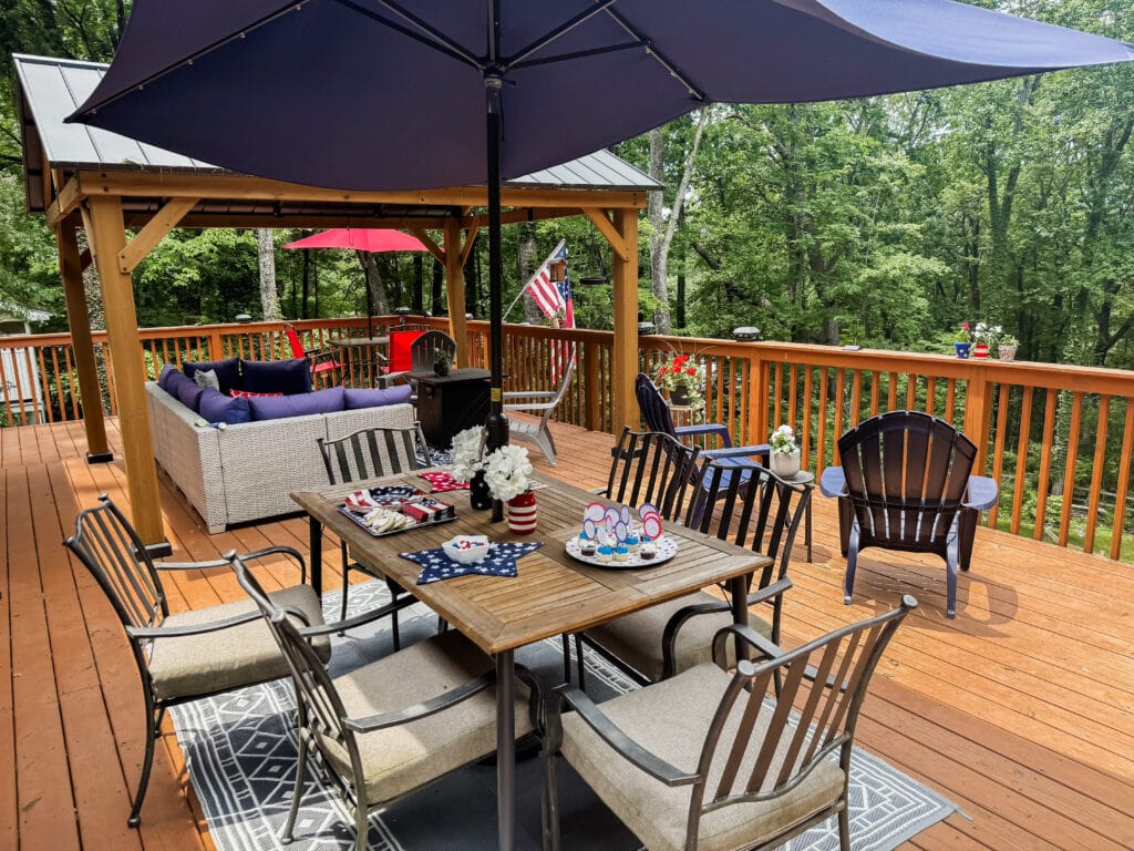 table with patriotic decorations next to gazebo