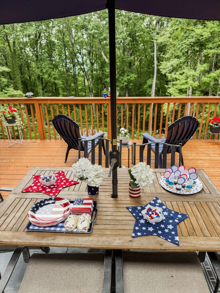 4th of july tablescape with decorations on deck
