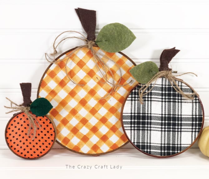 Pumpkin-shaped fall decor with plaid and check fabric patterns, suitable for seasonal home accents and festive decorations.