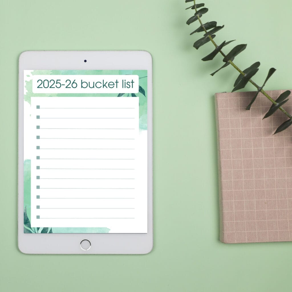 Celebrations and wins calendar on an iPad with floral and elegant workspace decor for organizing special moments and achievements.