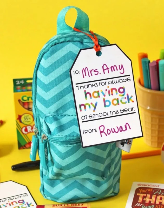 Bright turquoise chevron-patterned backpack personalized with a gift tag for Mrs. Amy, thanking her for always having my back at school, perfect for back-to-school gifts and teacher appreciation.