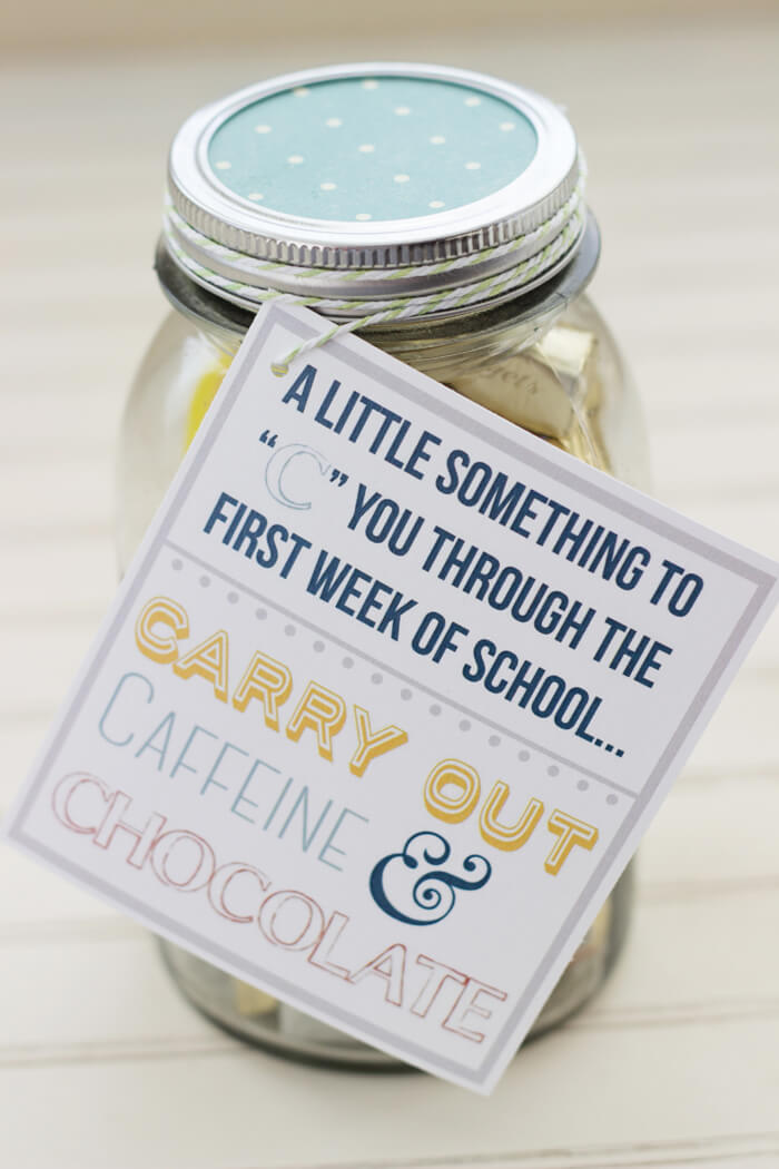 A little jar filled with cookies labeled with a humorous note about school, caffeination, and chocolate, perfect for gifting or cheering up educators.
