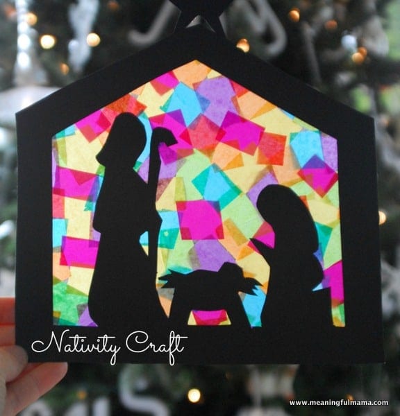 Silhouette nativity craft art with colorful stained glass background, holiday Christmas scene, decorative crafter's project, handmade nativity scene, festive home decor element.