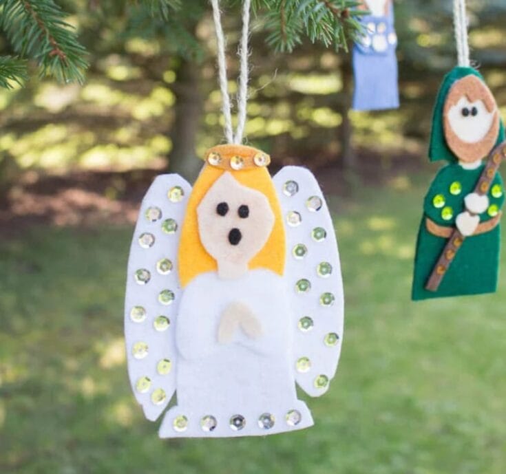 Felt angel Christmas ornament with sequins, handmade holiday decoration, felt craft, rustic home decor, and sentimental gift.