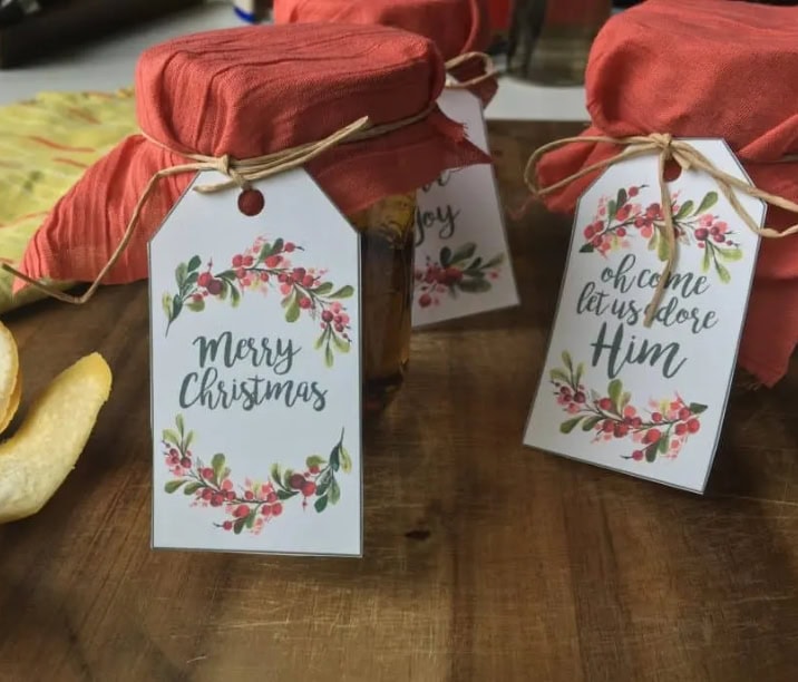 Merry Christmas and Christ centered holiday gifts with festive tags featuring holiday florals, ideal for Christmas decorating and gift-giving from A Hundred Affections.