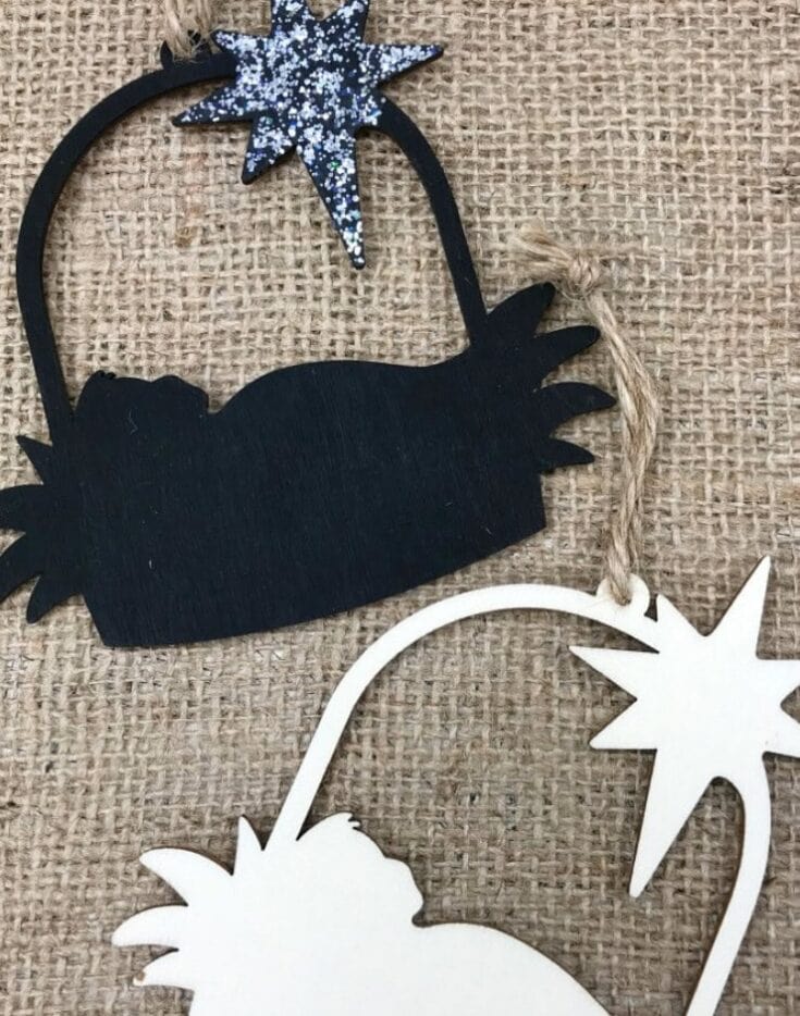 Star-shaped wooden wall decor with a black crab silhouette and glittery star, perfect for coastal or beach-inspired home decor.