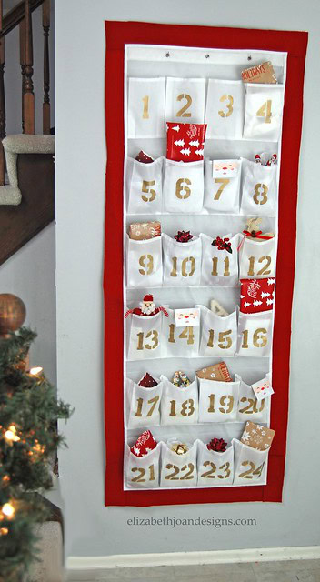 Colorful numbered Christmas wall pocket calendar with holiday ornaments and gifts, perfect for festive home decor and holiday organization during the Christmas season.