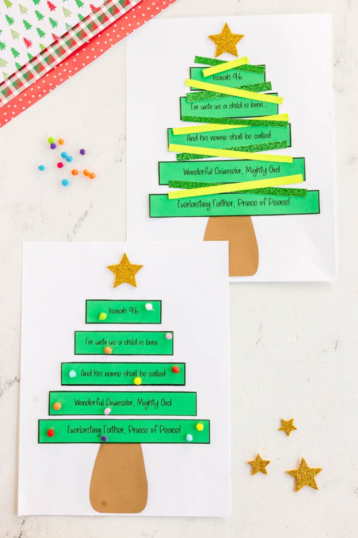 Festive Christmas tree craft with Bible verses on green paper strips, decorated with gold stars and colorful embellishments, perfect for kids' holiday activities.