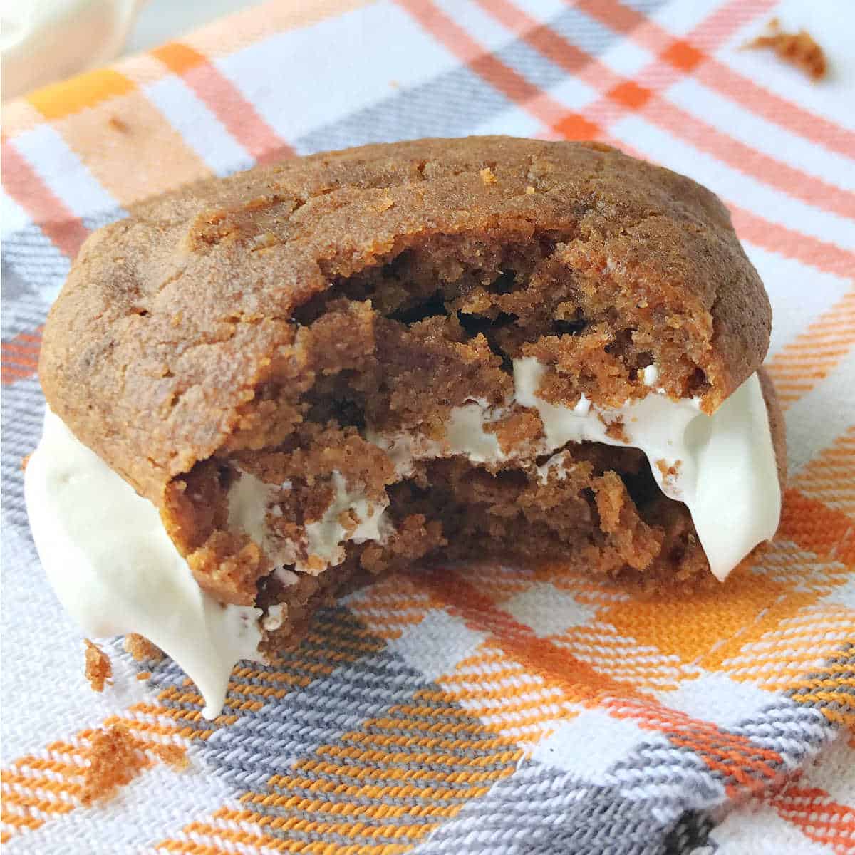 Crunchy chocolate chip cookies with creamy vanilla filling, perfect for indulging in homemade baked good comfort food.