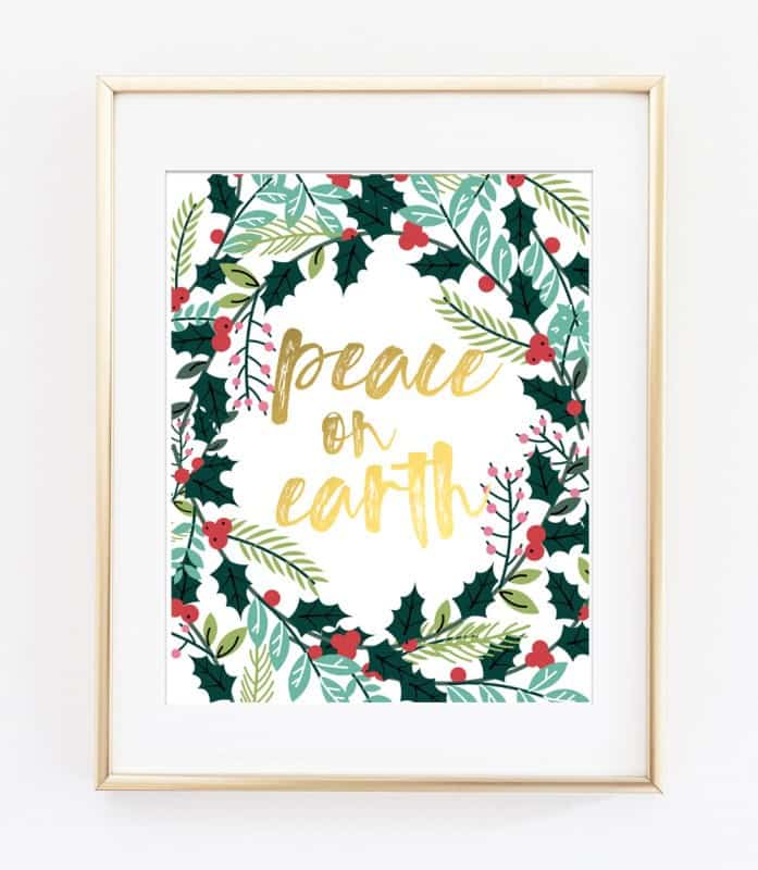 Peace on earth holiday decor print with holly and mistletoe botanical wreath, gold lettering.