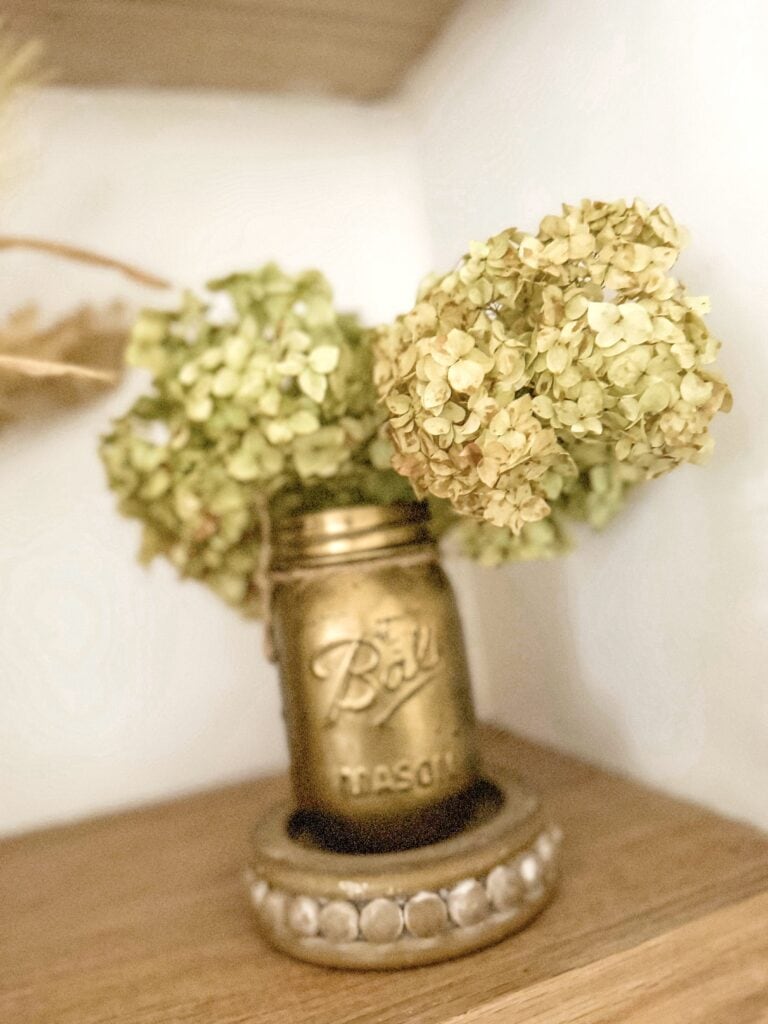 dried hydrangea in gold mason jar