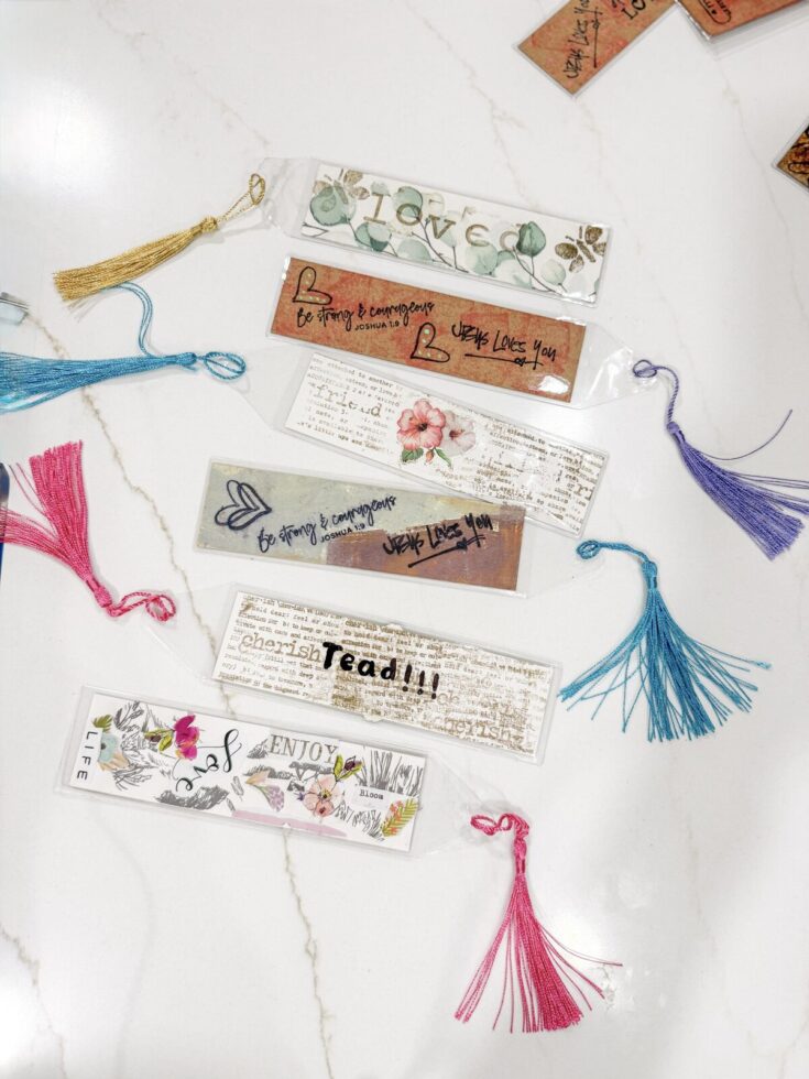 Love-themed bookmarks with inspirational quotes and colorful tassels, perfect for adding a touch of encouragement and style to your reading experience.