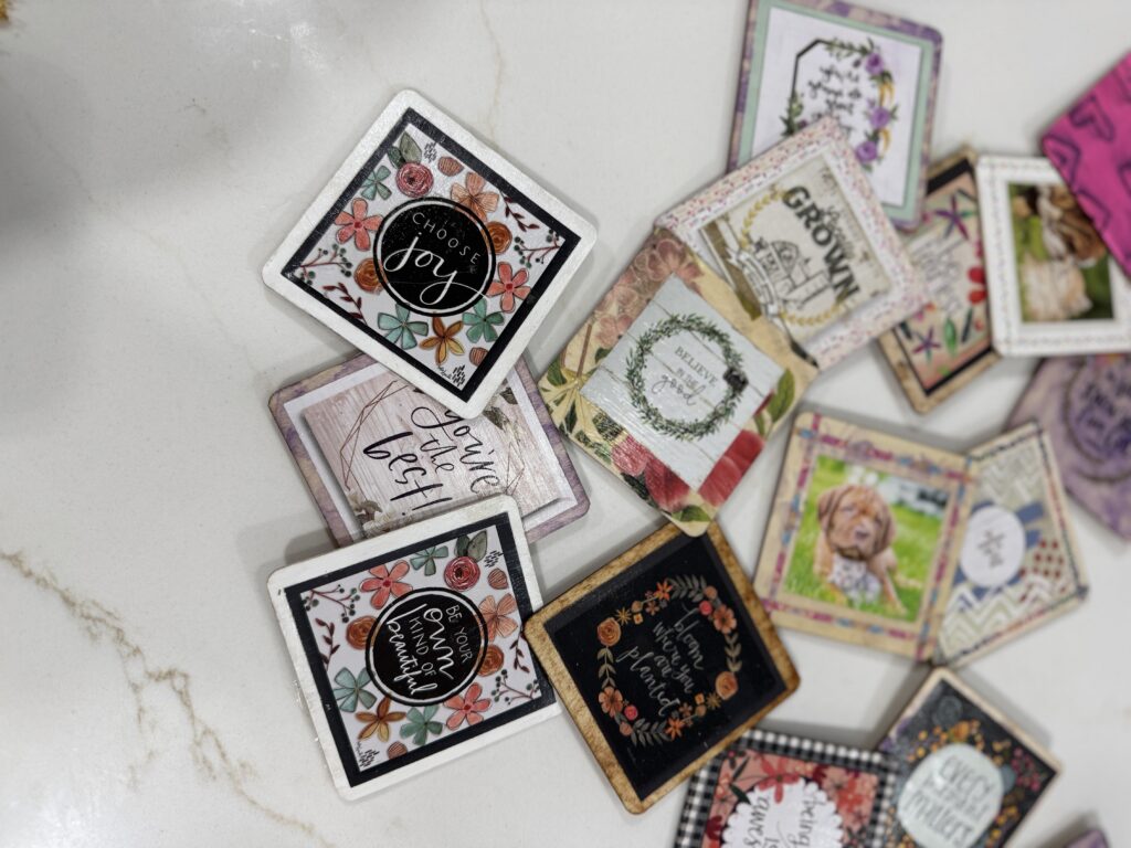 Colorful decorative magnets with inspirational quotes, floral designs, and motivational messages for scrapbooking, journaling, or DIY crafts.