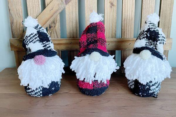 Colorful Christmas gnome decorations with cozy knitted hats and fluffy beards, perfect for holiday home decor.