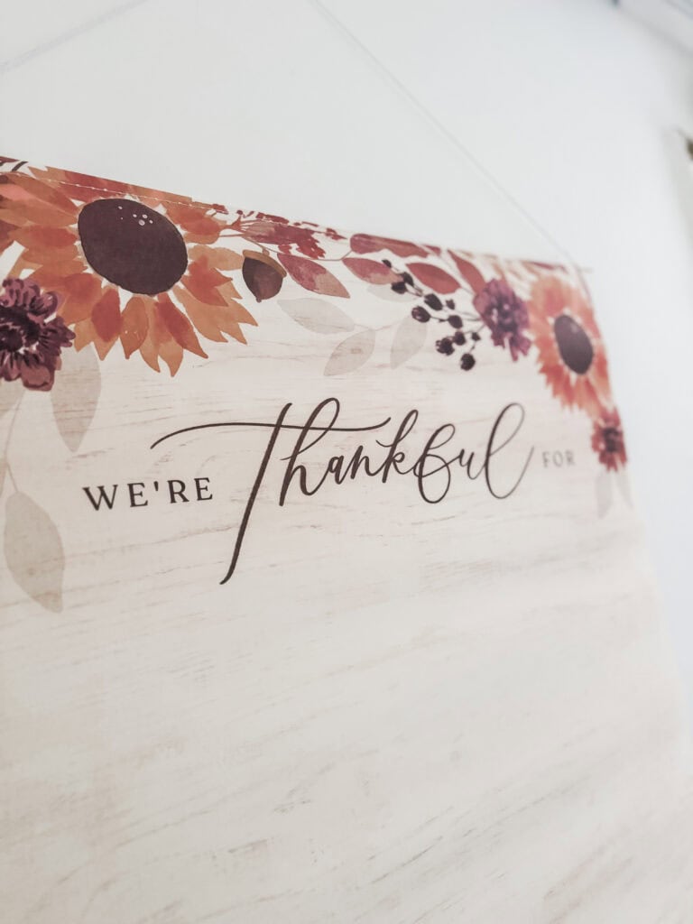 Beautiful thankful wall art with floral design, perfect for home decor, expressing gratitude, and creating a warm, inviting atmosphere.