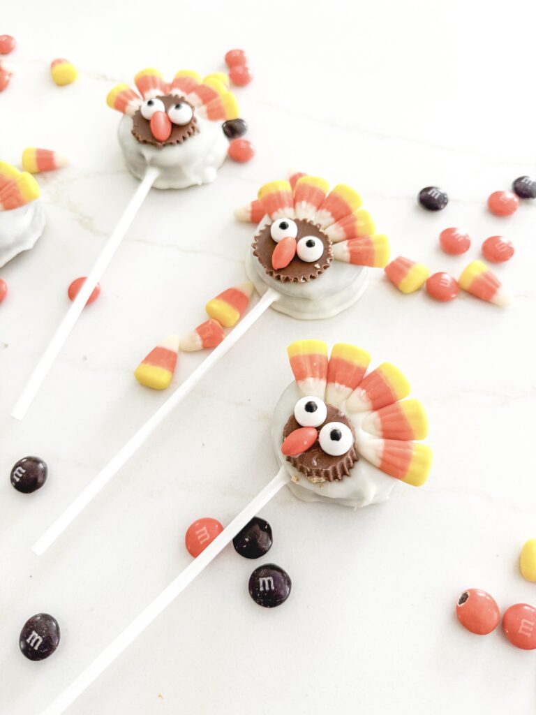 Colorful Turkey Treats with Candy Corn and M&Ms, cute Thanksgiving-themed dessert for kids, fun party snack, festive holiday sweet, fall celebration treat.
