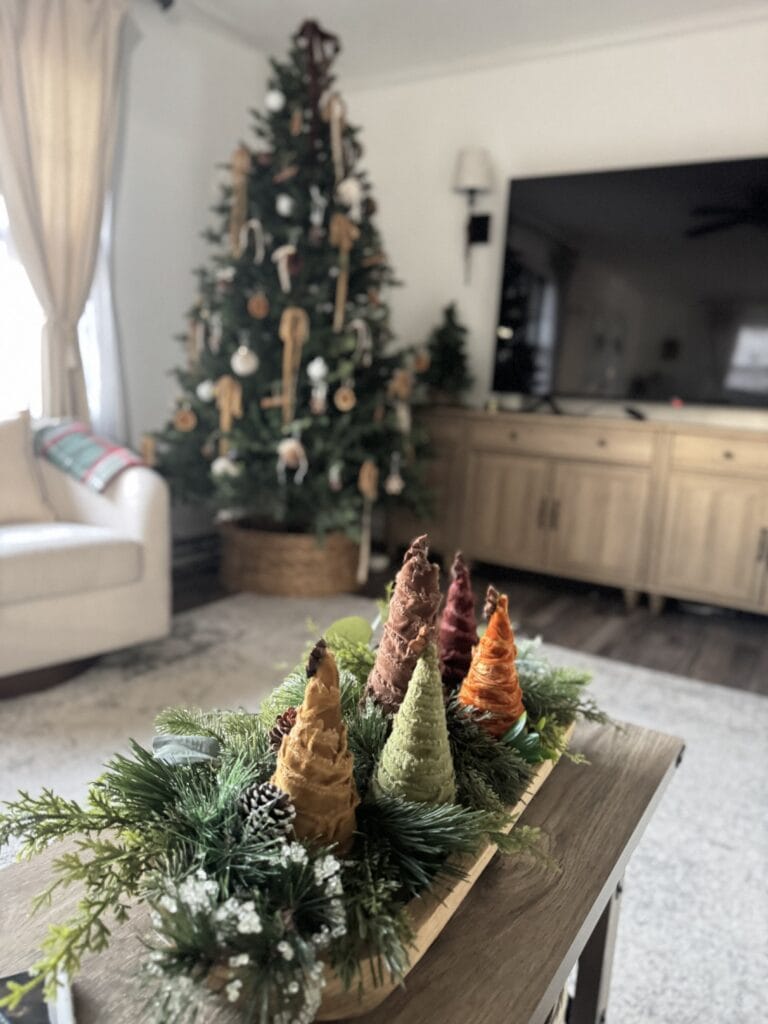 Colorful Christmas ice cream cone decorations in a festive holiday arrangement.