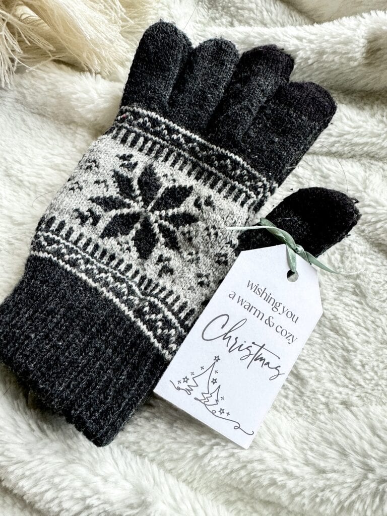 Cozy Christmas gift winter gloves with snowflake design, perfect for holiday warmth and festive holiday accessories, in black and grey, ideal for winter fashion and holiday gifting.