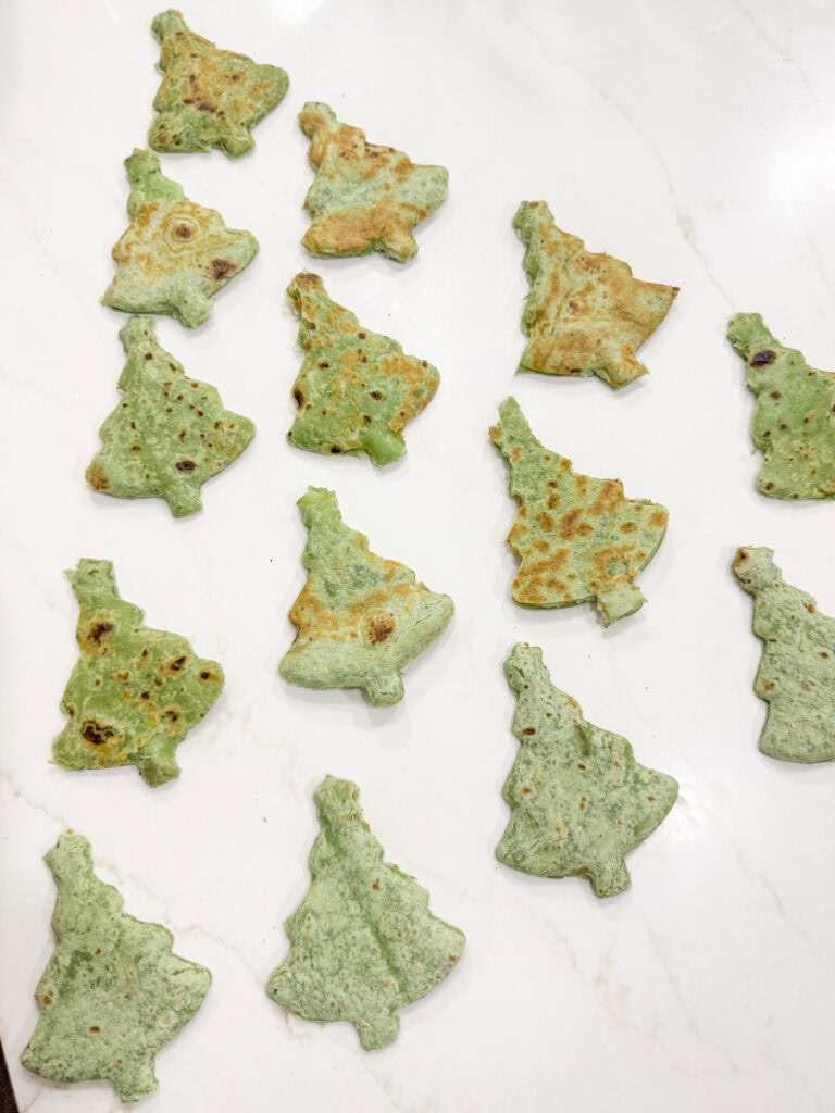 Green Christmas tree cookies with matcha, ideal for holiday baking and Christmas party desserts, festive and delicious.
