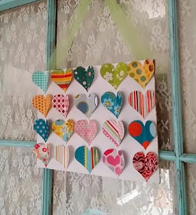 Colorful heart-themed gift card holder with various patterns and vibrant colors perfect for special occasions.