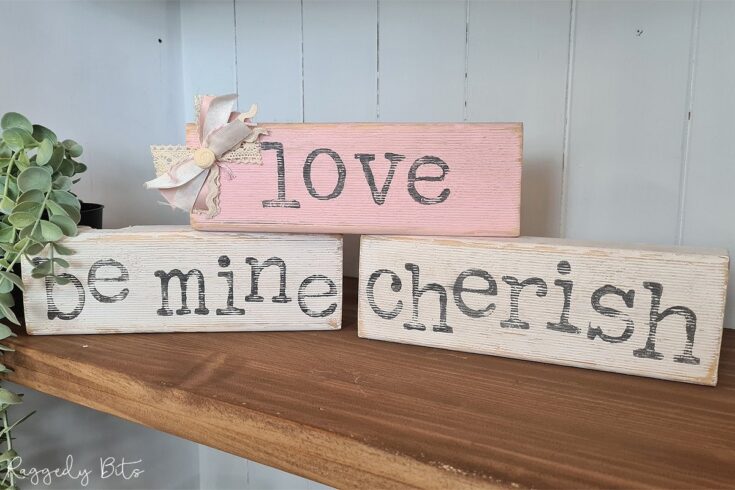 Handmade distressed wood signs with inspirational messages for home decor and gifts, featuring "Love," "Be Mine," and "Cherish" in rustic style.