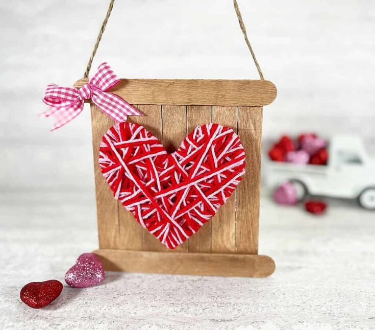 Bright red and white string heart on wooden sign, romantic Valentine decor, handcrafted love gift, rustic wedding decoration, heartfelt home accent.