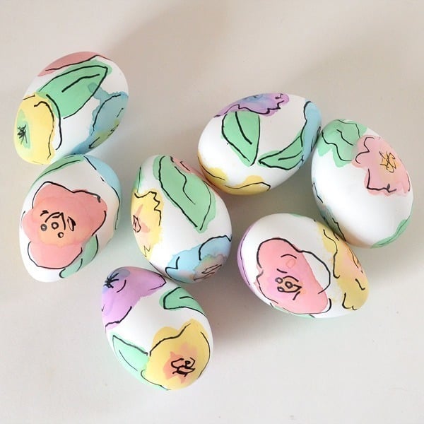 Vibrant decorated eggs featuring floral patterns and pastel colors, ideal for Easter decor, crafting, and spring celebrations - A Hundred Affections.