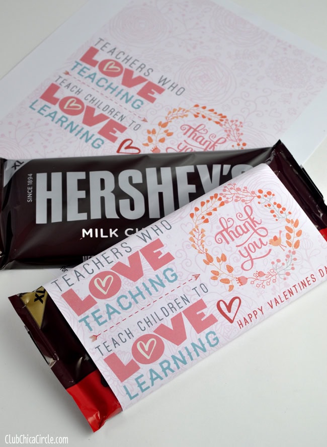 Bright Valentine card with "Thank you" message, hearts, and decorative floral design, perfect for expressing appreciation to teachers with chocolates for Valentine's Day.