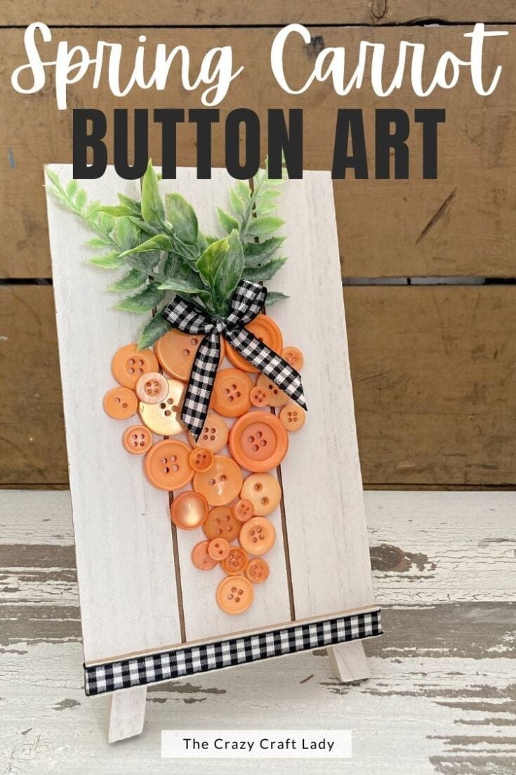 Whimsical spring carrot decor made with orange buttons and faux greenery, perfect for rustic home decor or spring crafts projects.
