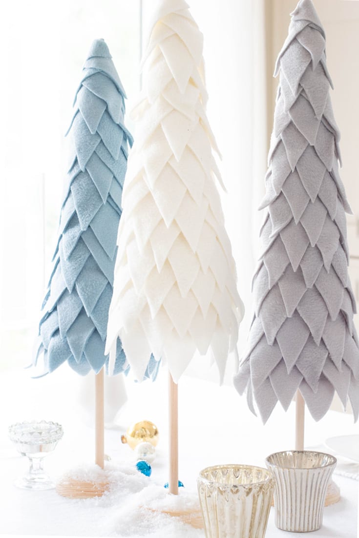 Colorful felt Christmas trees for holiday decor and table centerpieces, featuring soft textures and elegant design perfect for winter celebrations and home festive accents.