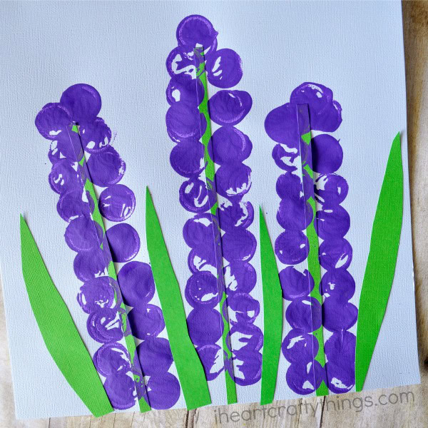 Vibrant purple grapevine painting with green leaves, showcasing creative hand-painted floral design perfect for decorative arts and unique home decor prompts.
