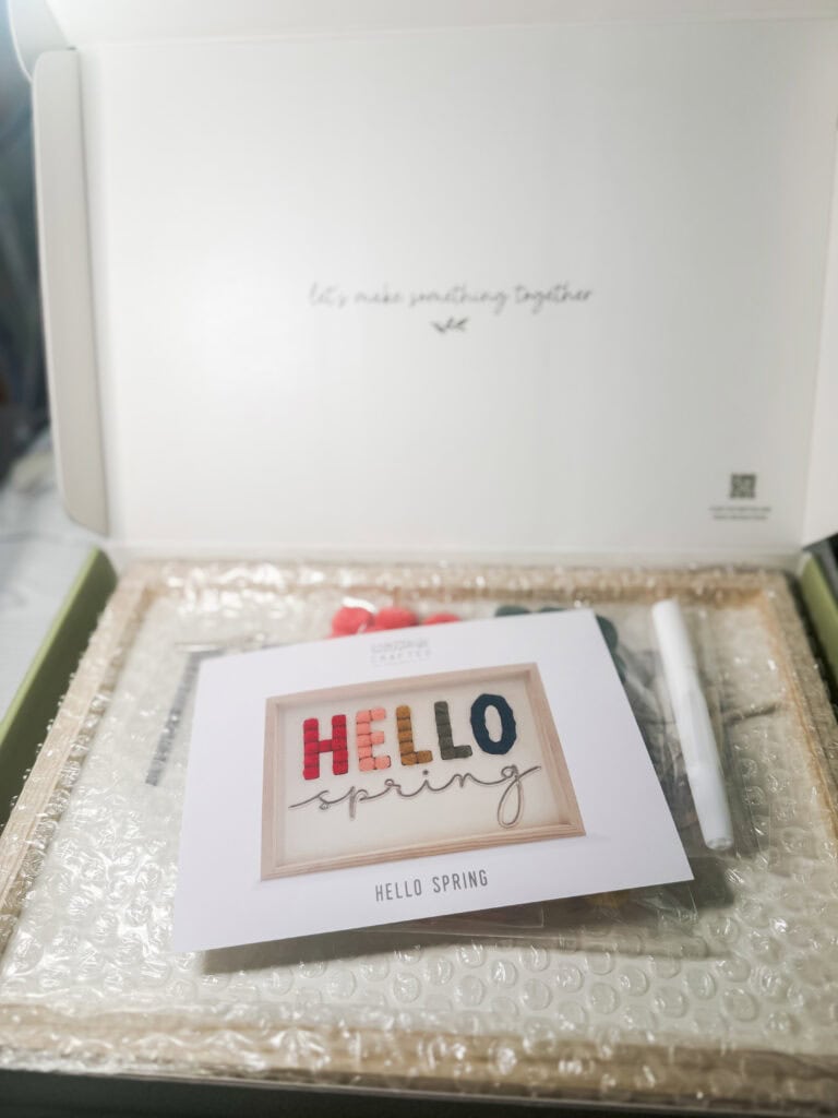 Bright and cheerful "Hello Spring" greeting card with colorful lettering, perfect for celebrating the season of renewal and new beginnings.