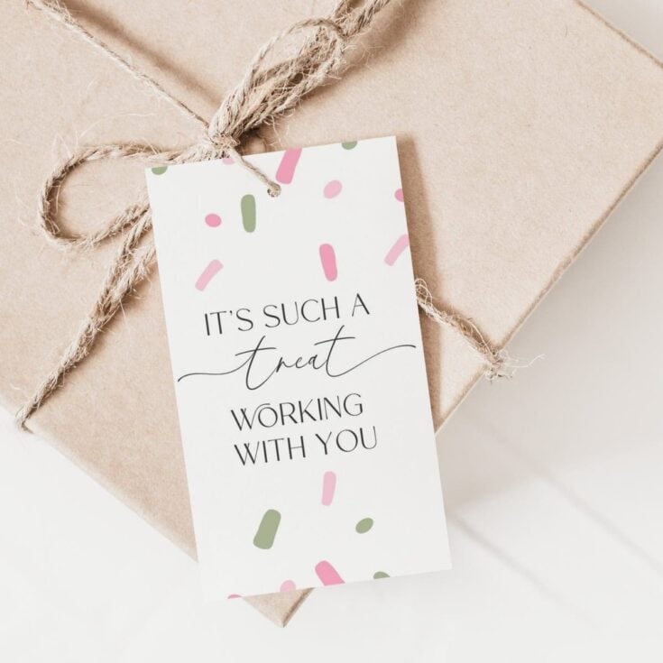 A beautifully wrapped gift box with a tag that says 'It's such a treat working with you,' perfect for expressing appreciation and celebrating special moments.