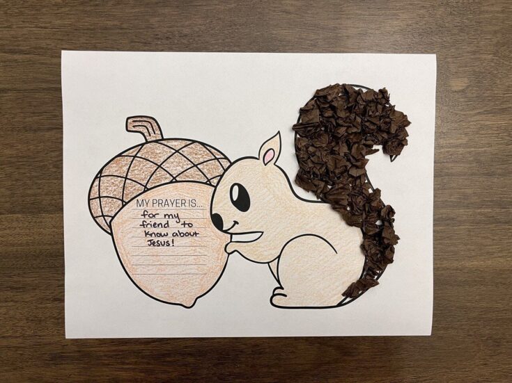 Handmade bunny craft with a prayer apple and a note about faith and friendship, perfect for children's religious activities or educational projects.