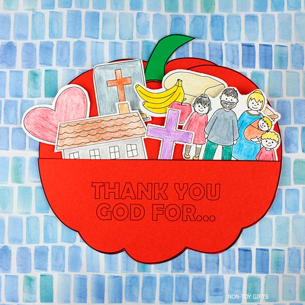 Colorful illustration of a red bowl filled with religious symbols, family, and gifts, expressing gratitude for non-toy gifts and blessings from God.