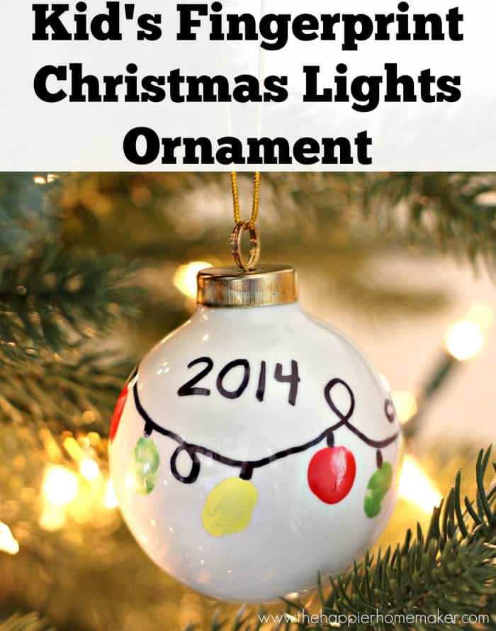 Decorative Christmas ornament with child's fingerprint design, featuring colorful lights and the year 2014, hanging on a Christmas tree branch for holiday decor.