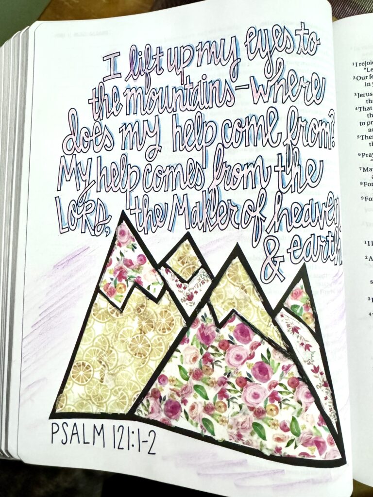 Hand-drawn mountain illustration with floral patterns and handwritten Psalm 121:1-2 quote, symbolizing faith and hope.